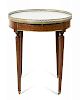 A Louis XVI Mahogany Bouillotte Table Height 29 x diameter of top 25 3/8 inches.