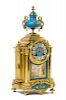 A Sevres Porcelain Mounted Gilt Bronze Mantel Clock Height 15 3/4 inches.