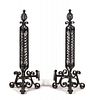 A Pair of Wrought Iron Andirons Height 36 inches.