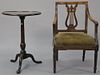Two piece lot including a round mahogany candlestand (ht. 28in., dia. 19 1/2in.) and a Continental armchair, both 19th centur