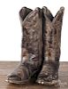 Pair of ceramic cowboy boots by Austin Prod Inc., 15'' h.