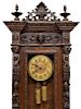 ITALIAN FIGURAL CARVED WEIGHT DRIVEN WALL CLOCK