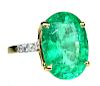 A Ladies 18 Karat Emerald & Diamond Ring