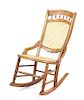 An American Pine Rocking Chair Height 33 inches.