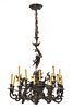 A Louis XV Style Gilt and Patinated Bronze Twenty-One Light Chandelier, Height 56 3/4 inches.