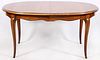 BODART OVAL WALNUT DINING TABLE AND TWO LEAVES