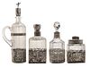 Four Silver Mounted Glass Bottles