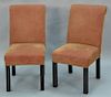 Set of six upholstered dining chairs.