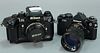 Nikon camera lot including Nikon F4 missing battery door (2173394) with 50/1.8 series E (2904015) and Nikon FE2 (2552730) wit