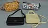 Four purses clutch bag Main License plate, Etienne, Aigner, Tignanello, and DKNY.
