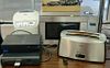 Group of electronics including Xbox, PS2 Playstation, G.E. microwave, Oster toaster.