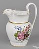 Philadelphia Tucker porcelain pitcher, ca. 1825, with floral and gilt decoration, 9 1/4'' h.