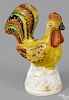 Pennsylvania painted chalkware rooster, 19th c., retaining its original polychrome surface, 5 1/2''