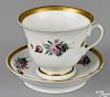 Rare Philadelphia Tucker porcelain mug and saucer, ca. 1825, initialed AEM, 3 7/8'' h., 6 1/2''dia