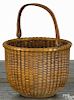 Nantucket lightship basket, ca. 1900, attributed to William Appleton, with a swing handle, 4'' h.