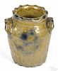Miniature stoneware crock, 19th c., with cobalt floral decoration and a coggled rim and handles, 2