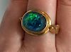 22 KARAT YELLOW GOLD AND BLACK OPAL DOUBLET RING