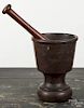 Two walnut and lignum vitae mortar and pestles, 18th c., 10'' h. and 13'' h.