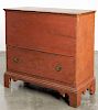 New England painted pine blanket chest, 19th c., with a single drawer, resting on tall bracket feet,