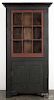 Bryce Ritter contemporary painted pine cupboard, dated 2002, with a red and black surface, 82 3/4''
