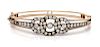 A Victorian Silver Topped Gold and Diamond Bangle Bracelet, 10.40 dwts.