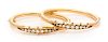 A Pair of Yellow Gold and Diamond Bangle Bracelets, 21.00 dwts.