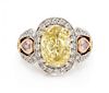 A Platinum, Bicolor Gold, Colored Diamond and Diamond Ring, Michael Beaudry, 8.50 dwts.