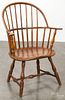 Pennsylvania painted sackback Windsor armchair, late 18th c., retaining an old pumpkin surface.