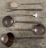 Six wrought iron utensils, 19th c., with punch decorated handles, longest - 19'' l.