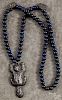 Native American Indian beaver amulet on a beaded necklace, stamped Mont?, 2 3/4'' l.