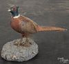 Carved and painted pine pheasant, mid 20th c., signed D & M Nichols, 6'' h., 9'' l.