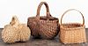 Three contemporary splint baskets, two signed Muehling Lititz Pa, 7'' h., 9'' h., and 8'' h.
