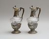PAIR OF CONTINENTAL CUT-GLASS CLARET JUGS WITH SILVER-PLATED MOUNTS