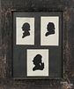 Group of three silhouettes of women, 19th c., in a painted pine frame, each image - 3'' x 2 3/4''.