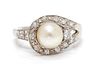 A 14 Karat White Gold, Cultured Pearl and Diamond Ring, 2.30 dwts.