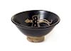 A White Slip Decorated Black Glazed Stoneware Bowl