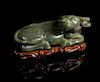 A Carved Spinach Jade Figure of a Water Buffalo