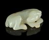 A Carved White Jade Figure of a Dog