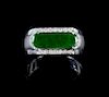 A Jadeite and 18K White Gold Mounted Ring Length of jade 5/8 inches.