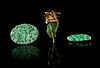 Three Jadeite and Yellow Gold Mounted Brooches Length of largest 1 3/4 inches.