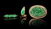 Three Jadeite and Yellow Gold Mounted Articles Length of largest 2 1/2 inches.