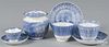 Three blue spatter cups and saucers