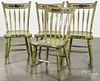 Set of four Pennsylvania painted plank seat chairs
