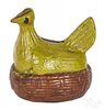 Painted redware hen on nest bank, 19th c.