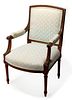 AN EARLY 20TH CENTURY LOUIS XVI OPEN ARM FAUTEUIL