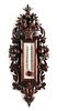 A VERY GOOD WELL-CARVED BLACK FOREST THERMOMETER