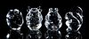 FOUR STEUBEN CRYSTAL FIGURAL HAND COOLERS