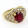 Vintage Oval Cut Ruby, Diamond and 14 Karat Yellow Gold Ring..