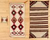 Three Navajo weavings.