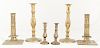 Three pairs of brass candlesticks